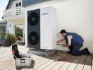Press picture: Heat pump aroTHERM plus outside with installer